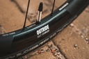 JUEGO DE RINES FFWD OUTRIDE RUTA/GRAVEL ALU DT350 12x100mm & 12x142mm (HG) NEGRO MATTE